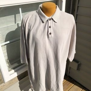 Cream colored Tommy Bahama polo shirt